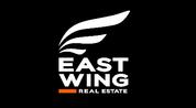 East wing logo image