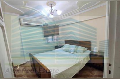 Apartment - 2 Bedrooms - 2 Bathrooms for rent in Mohammed Al Eqbal St. - Laurent - Hay Sharq - Alexandria