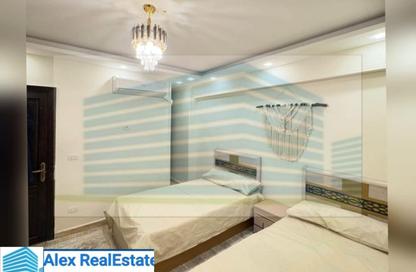 Apartment - 2 Bedrooms - 1 Bathroom for rent in Omar Lotfy St. - Sporting - Hay Sharq - Alexandria