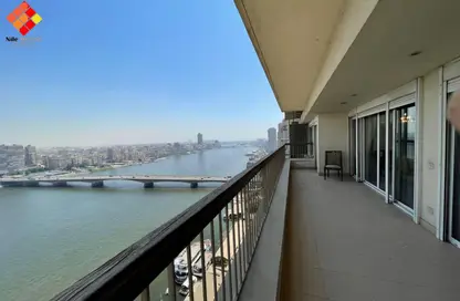 شقة - 4 غرف نوم - 5 حمامات للايجار في شارع النيل - الدقي - الجيزة