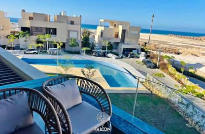 Chalet - 2 Bedrooms - 2 Bathrooms for sale in Hacienda Waters - Qesm Ad Dabaah - North Coast