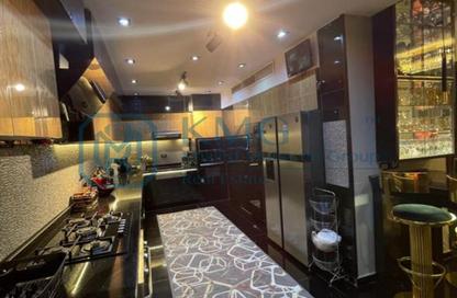 Apartment - 3 Bedrooms - 4 Bathrooms for sale in Mohamed Naguib Axis - Abou El Houl - New Cairo City - Cairo