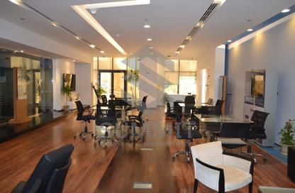 Half Floor - Studio - 4 Bathrooms for rent in Bank Center Street - South Teseen St. - The 5th Settlement - New Cairo City - Cairo
