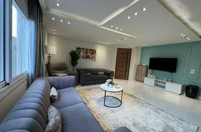 شقة - 2 غرف نوم - 2 حمامات للايجار في شارع محي الدين أبو العز - الدقي - الجيزة