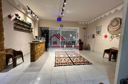 محل تجاري - استوديو - 1 حمام للبيع في شارع نادي الصيد - الدقي - الجيزة