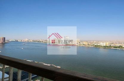 Apartment - 3 Bedrooms - 3 Bathrooms for sale in Nile St. - Dokki - Giza