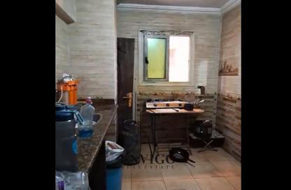 Apartment - 4 Bedrooms - 2 Bathrooms for sale in Ahmed Al Zomor St. - 10th District - Nasr City - Cairo