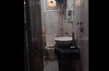 Apartment - 4 Bedrooms - 2 Bathrooms for sale in Ahmed Al Zomor St. - 10th District - Nasr City - Cairo