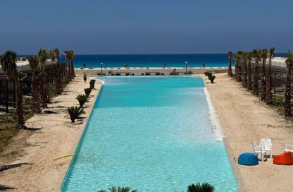 Chalet - 3 Bedrooms - 2 Bathrooms for sale in Hacienda Waters - Qesm Ad Dabaah - North Coast
