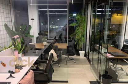 Office Space - Studio - 2 Bathrooms for rent in Cairo Festival City - North Investors Area - New Cairo City - Cairo