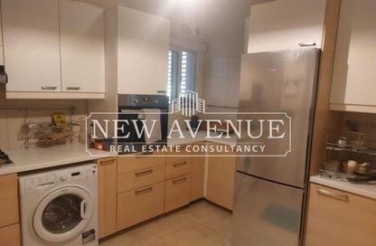 Apartment - 2 Bedrooms - 2 Bathrooms for sale in The Village - South Investors Area - New Cairo City - Cairo