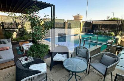Villa - 5 - 7+ for sale in Upville - Cairo Alexandria Desert Road - 6 October City - Giza