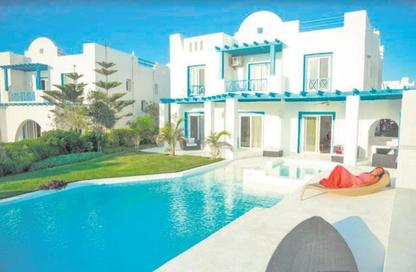 Townhouse - 4 Bedrooms - 3 Bathrooms for sale in Mountain View - Ras Al Hekma - North Coast