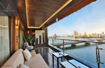 شقة - 3 غرف نوم - 2 حمامات للايجار في شارع النيل - الدقي - الجيزة