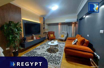 Apartment - 2 Bedrooms - 2 Bathrooms for rent in Shafik Mansour St. - Zamalek - Cairo