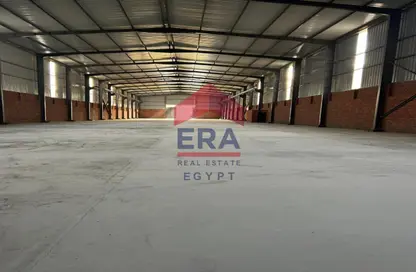 مصنع - استوديو - 1 حمام للايجار في طريق الاسمايلية الصحراوي - طريق فايد - المنطقة الصناعية - مدينة العاشر من رمضان - الشرقية