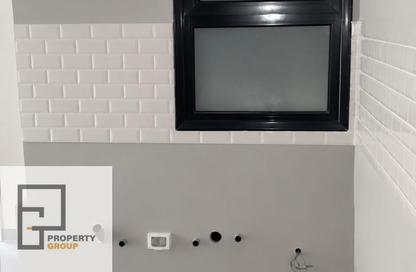 Apartment - 1 - 1 for sale in Village West - Sheikh Zayed Compounds - Sheikh Zayed City - Giza