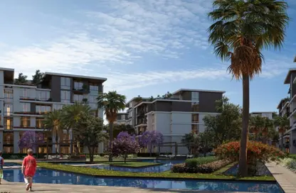 Apartment - 3 Bedrooms - 3 Bathrooms for sale in Tesla Residence - Al Wahat Road - 6 October City - Giza