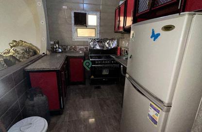 Apartment - 2 Bedrooms - 1 Bathroom for sale in Mohamed Naguib Axis - Abou El Houl - New Cairo City - Cairo