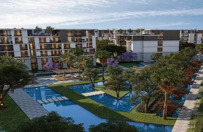 Apartment - 3 Bedrooms - 2 Bathrooms for sale in Tesla Residence - Al Wahat Road - 6 October City - Giza