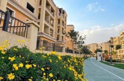 Apartment - 2 Bedrooms - 2 Bathrooms for sale in Suez Road - New Cairo City - Cairo
