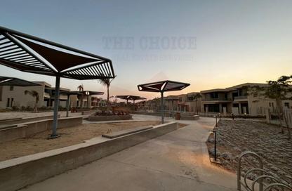 Townhouse - 4 - 3 for sale in Badya Palm Hills - 6 October Compounds - 6 October City - Giza
