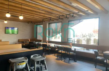 محل تجاري - استوديو - 2 حمامات للايجار في اركان بلازا - محور 26 يوليو - الشيخ زايد - الجيزة