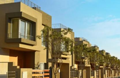 Townhouse - 4 - 4 for sale in Palm Hills WoodVille - Al Wahat Road - 6 October City - Giza