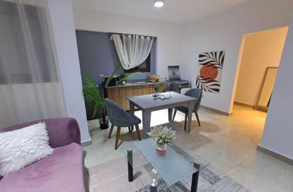 Apartment - 2 Bedrooms - 2 Bathrooms for rent in Zizinia St. - South Investors Area - New Cairo City - Cairo