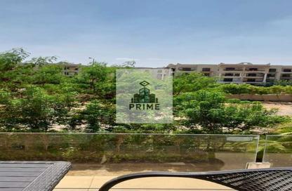 Apartment - 2 Bedrooms - 2 Bathrooms for sale in Palm Hills Village Gate - South Investors Area - New Cairo City - Cairo