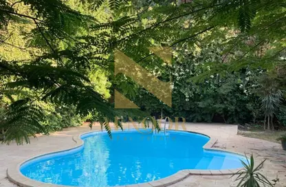 Villa - 5 Bedrooms - 6 Bathrooms for sale in Dream Land - Al Wahat Road - 6 October City - Giza