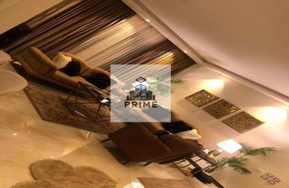 Apartment - 2 Bedrooms - 2 Bathrooms for sale in Palm Hills Village Gate - South Investors Area - New Cairo City - Cairo