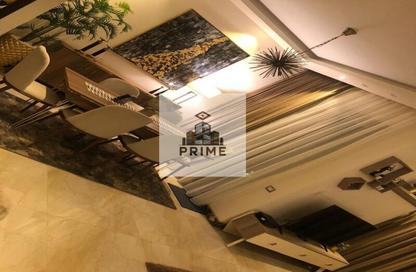 Apartment - 2 Bedrooms - 2 Bathrooms for sale in Palm Hills Village Gate - South Investors Area - New Cairo City - Cairo