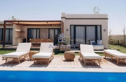 Villa - 5 Bedrooms - 6 Bathrooms for sale in Beit Al Bahr - Sidi Heneish - North Coast