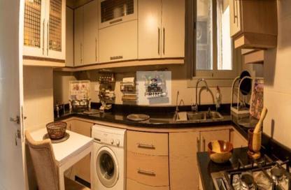 Apartment - 2 Bedrooms - 2 Bathrooms for sale in Palm Hills Village Gate - South Investors Area - New Cairo City - Cairo