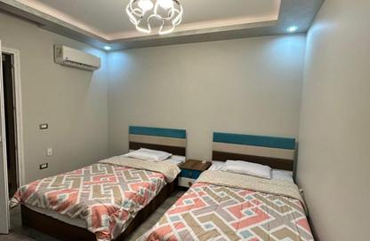 Apartment - 2 Bedrooms - 2 Bathrooms for rent in Karma Residence - 16th District - Sheikh Zayed City - Giza