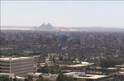 شقة - 3 غرف نوم - 3 حمامات للايجار في شارع الدكتور ميشيل باخوم - الدقي - الجيزة