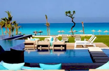 Chalet - 2 Bedrooms - 2 Bathrooms for sale in Hacienda Waters - Qesm Ad Dabaah - North Coast