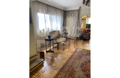 Apartment - 4 Bedrooms - 4 Bathrooms for sale in Ahmed Orabi St. - Mohandessin - Giza