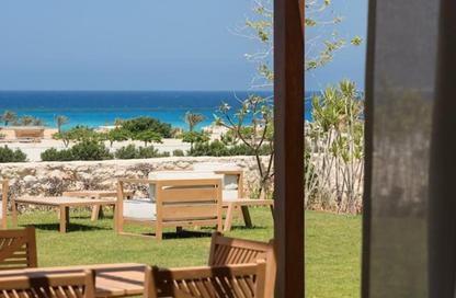 Chalet - 3 Bedrooms - 4 Bathrooms for sale in Beit Al Bahr - Sidi Heneish - North Coast Chalet - 3 Bedrooms - 4 Bathrooms for sale in Beit Al Bahr - Sidi Heneish - North Coast