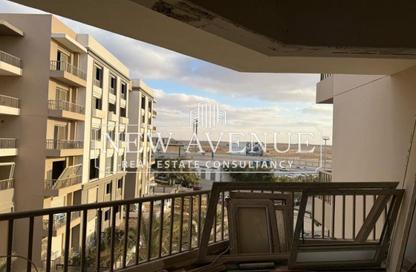 Apartment - 2 Bedrooms - 2 Bathrooms for sale in The Residences - New Cairo City - Cairo