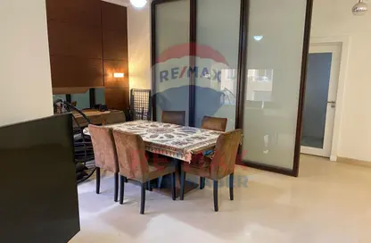 Apartment - 2 Bedrooms - 2 Bathrooms for sale in The Village - South Investors Area - New Cairo City - Cairo