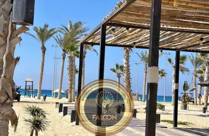 Chalet - 2 Bedrooms - 2 Bathrooms for sale in Ramla Lakeside - Qesm Ad Dabaah - North Coast