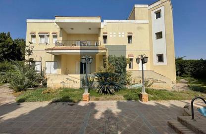 Villa - 5 Bedrooms - 6 Bathrooms for sale in Mena Garden City - Al Motamayez District - 6 October City - Giza