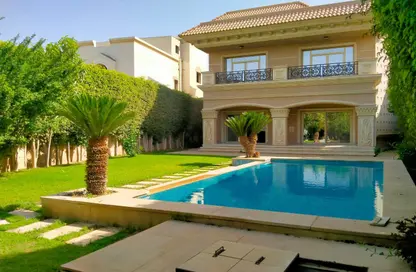 Villa - 4 Bedrooms - 6 Bathrooms for rent in Rawda - Al Wahat Road - 6 October City - Giza