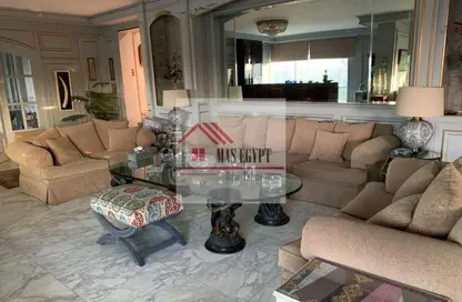 شقة - 6 غرف نوم - 4 حمامات للبيع في شارع نادي الصيد - الدقي - الجيزة