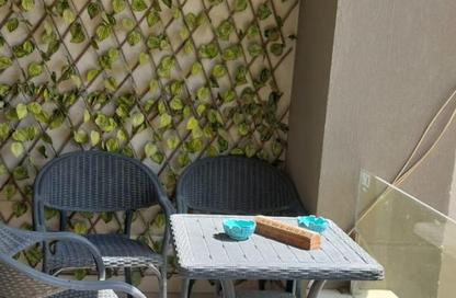 Apartment - 2 - 2 for sale in Palm Hills Village Gate - South Investors Area - New Cairo City - Cairo
