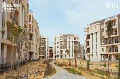 Apartment - 2 Bedrooms - 2 Bathrooms for sale in Isola Sheraton - El Saaqah St. - Sheraton Al Matar - El Nozha - Cairo