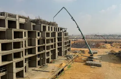 Apartment - 2 Bedrooms - 2 Bathrooms for sale in Karma Residence - 16th District - Sheikh Zayed City - Giza