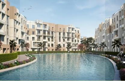 Apartment - 4 Bedrooms - 4 Bathrooms for sale in Aqmar - Al Wahat Road - 6 October City - Giza